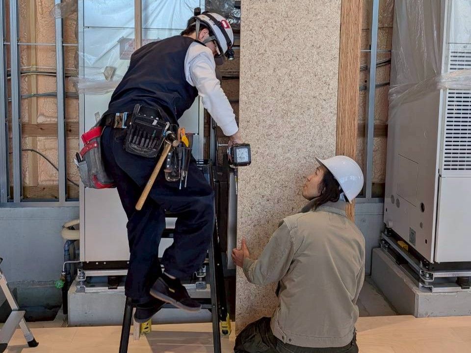 現場で笑顔の職人